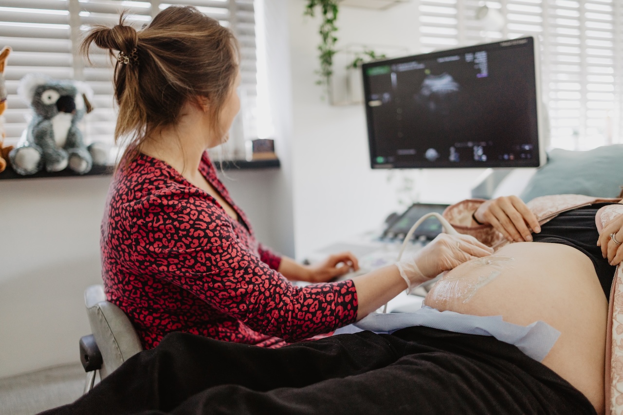 Maria Birch performing an early pregnancy scan in Barnstaple at Sneak-A-Peek Ultrasound.